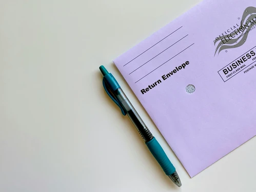 Return ballot envelope and pen